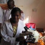 Dispensary Jordan University in Morogoro showing blood spinner and microscope used in Malaria testi